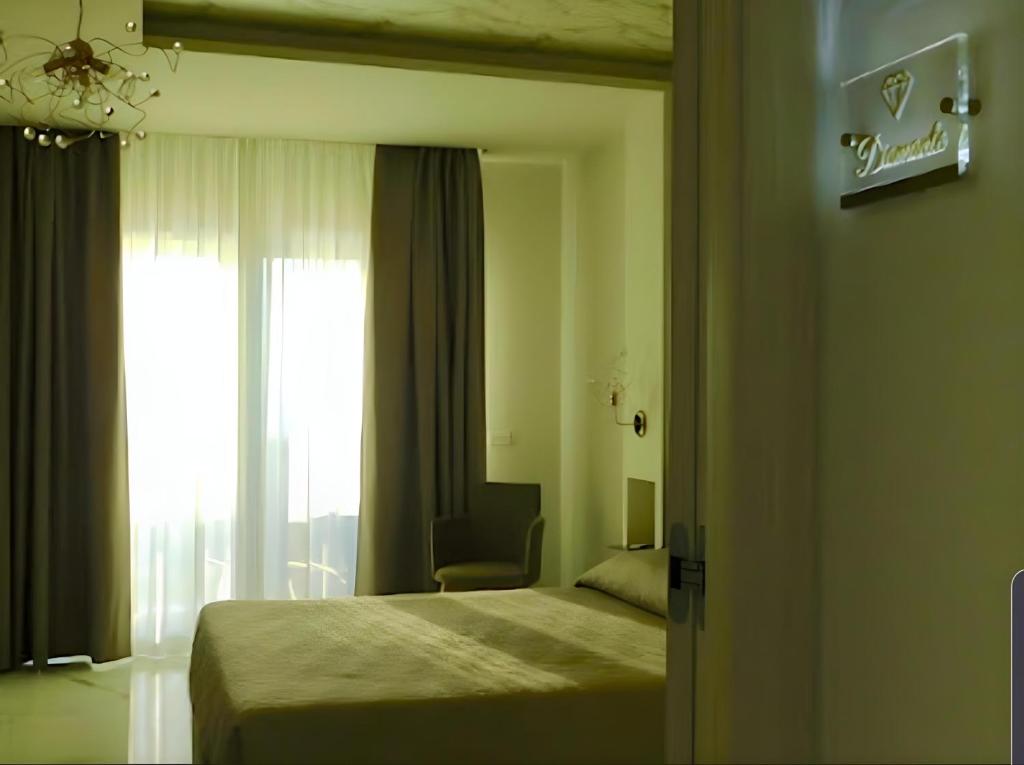 Postel nebo postele na pokoji v ubytování Suite Èlite Rooms