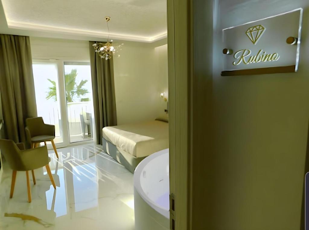 Postel nebo postele na pokoji v ubytování Suite Èlite Rooms