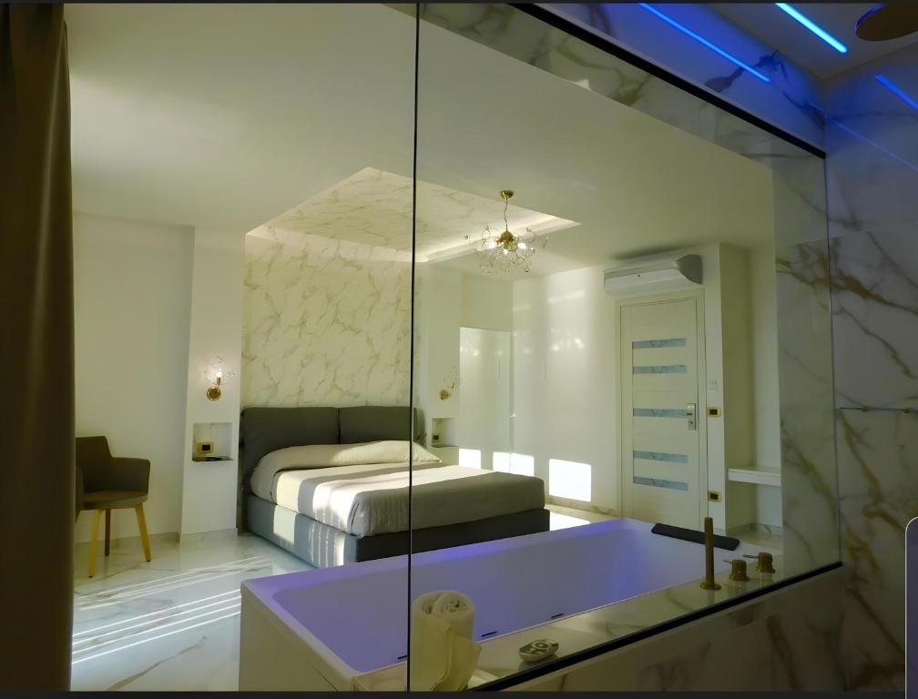 Postel nebo postele na pokoji v ubytování Suite Èlite Rooms