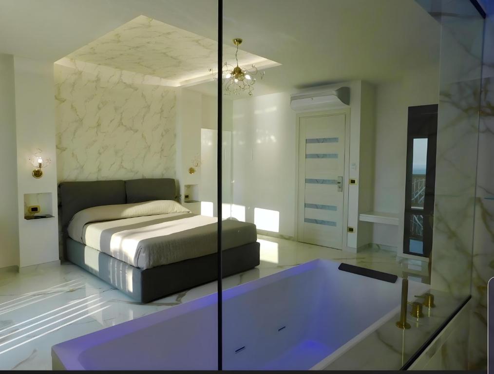 Postel nebo postele na pokoji v ubytování Suite Èlite Rooms