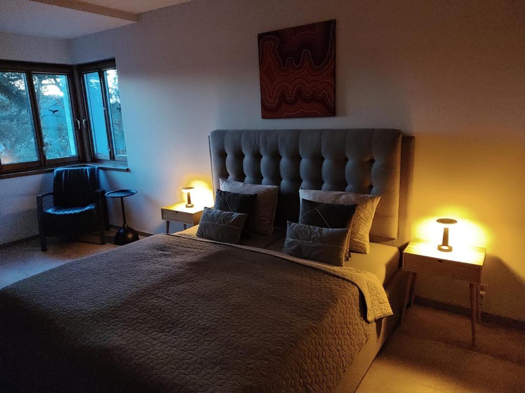 Postel nebo postele na pokoji v ubytování Apartmány FELSENBURG Staré Splavy
