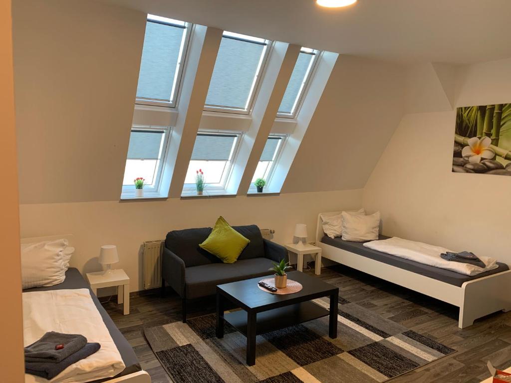 Postel nebo postele na pokoji v ubytování CityApartment Platinum-Zentrum mit Parkplatz