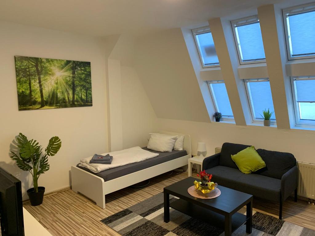 Posezení v ubytování CityApartment Platinum-Zentrum mit Parkplatz