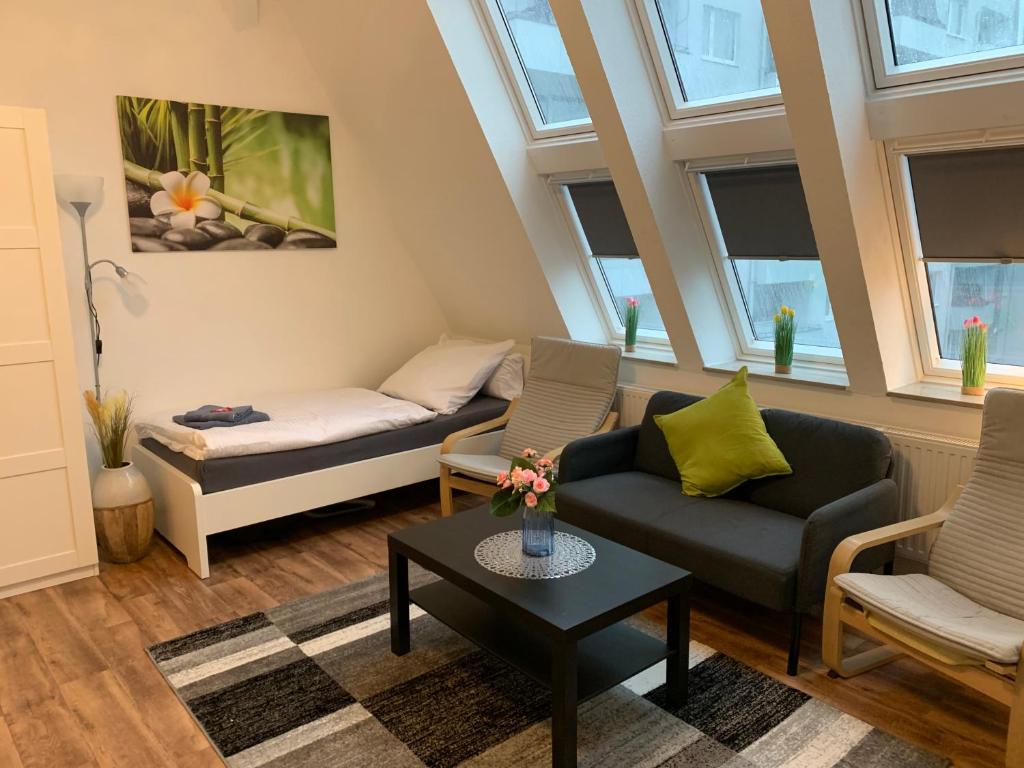 Posezení v ubytování CityApartment Platinum-Zentrum mit Parkplatz