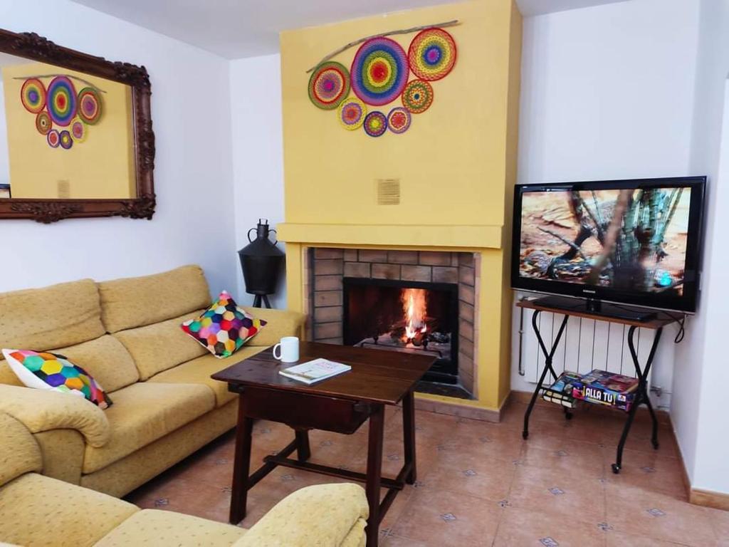 TV a/nebo společenská místnost v ubytování Vivienda Rural Belén