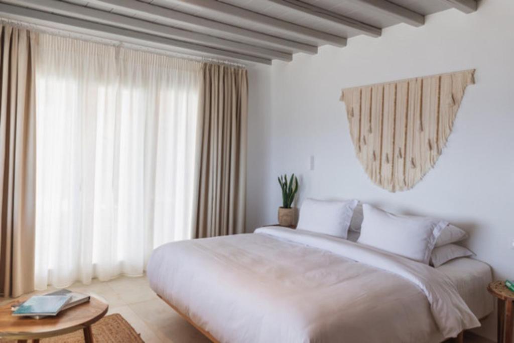 Posteľ alebo postele v izbe v ubytovaní Birdhouse Private Luxury Suite