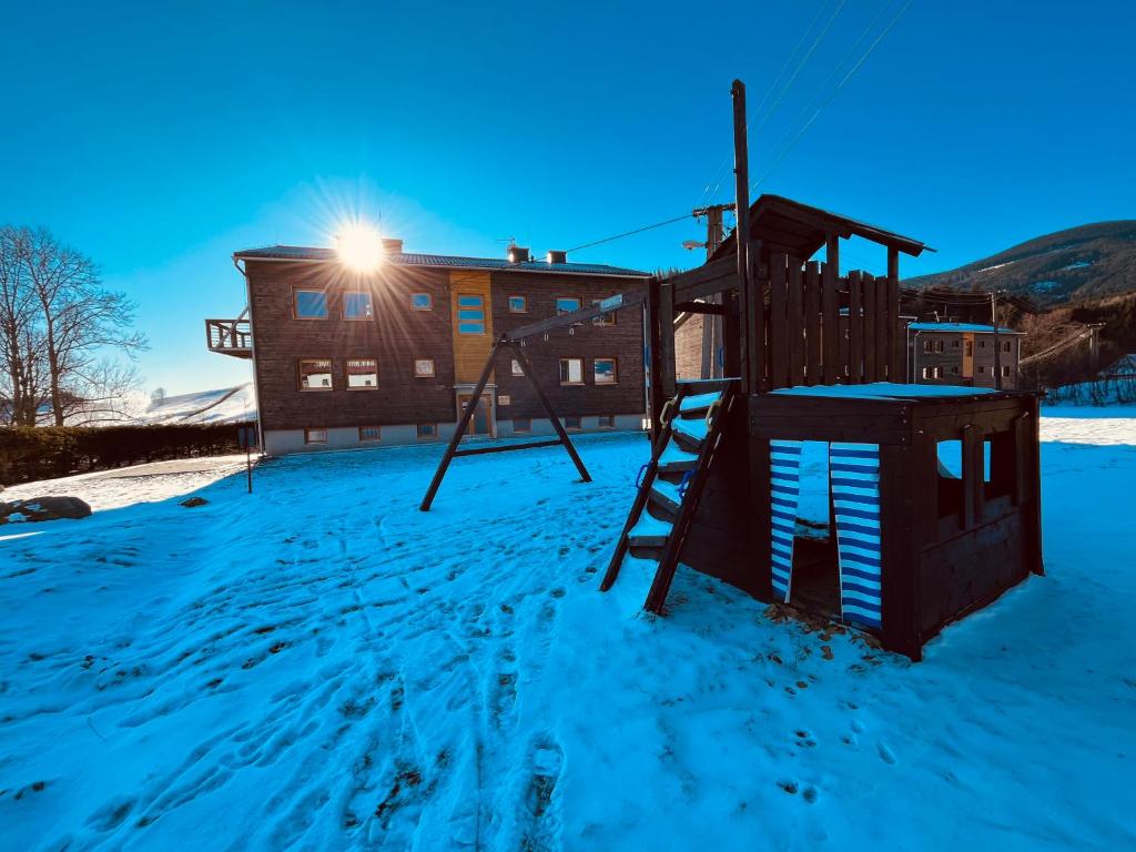 Apartmány Špička - Stříbrnice u sjezdovky v zimě