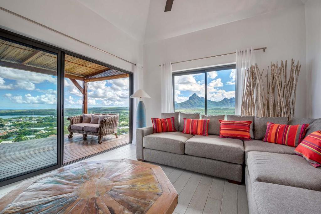 Posezení v ubytování Villa Teranga avec vue panoramique sur la baie de Tamarin