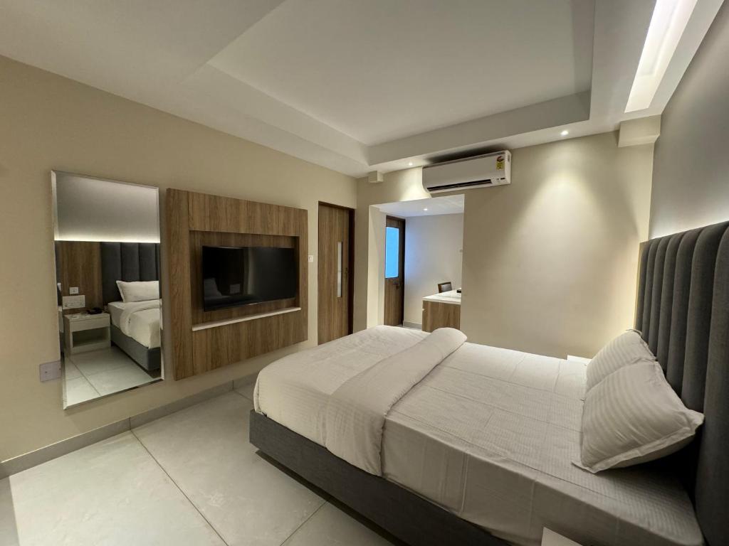 Postel nebo postele na pokoji v ubytování Hotel Devdeep Porvorim