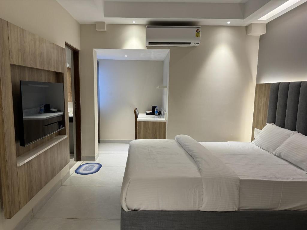 Postel nebo postele na pokoji v ubytování Hotel Devdeep Porvorim