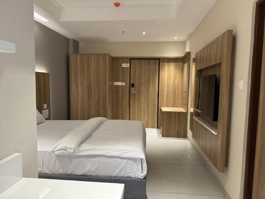 Postel nebo postele na pokoji v ubytování Hotel Devdeep Porvorim