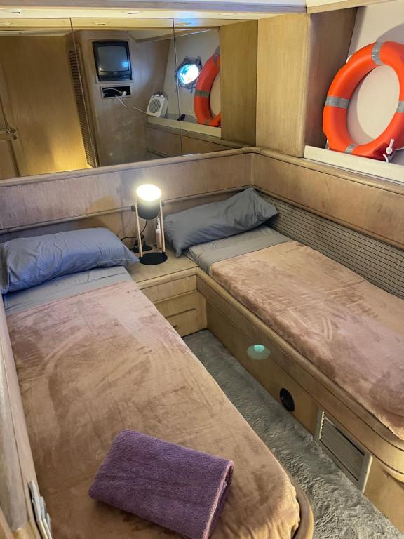 Postel nebo postele na pokoji v ubytování Yate Hotel STV