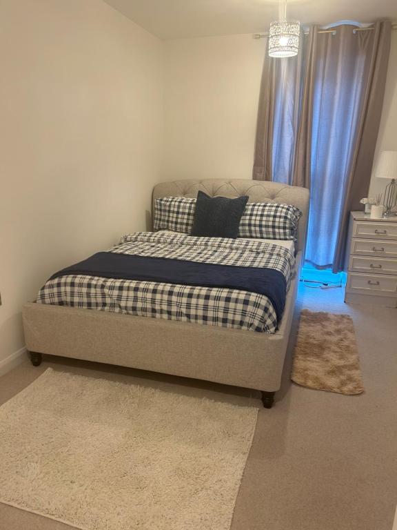 Postel nebo postele na pokoji v ubytování En-suite Double Room in a shared apartment close to central London