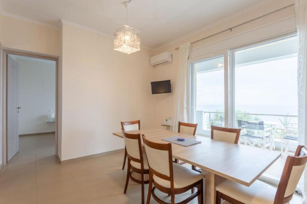 Televízia a/alebo spoločenská miestnosť v ubytovaní Corfu Sea View Villa - Alya