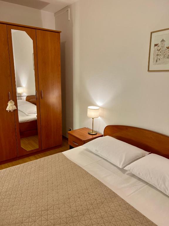 Postel nebo postele na pokoji v ubytování Villa Adria