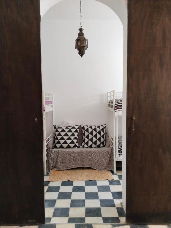 Postel nebo postele na pokoji v ubytování Dar Gara