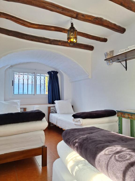 Letto o letti in una camera di Dar Gabriel