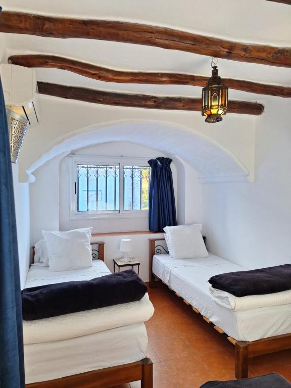 Letto o letti in una camera di Dar Gabriel