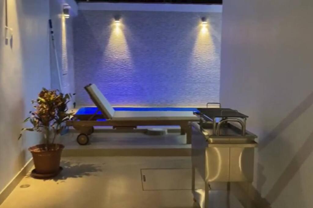 a hospital room with a bed in front of a window at Hamaka Beach House in Boca del Charán
