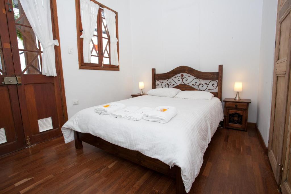 Postel nebo postele na pokoji v ubytování Arche Noah Boutique Hostel