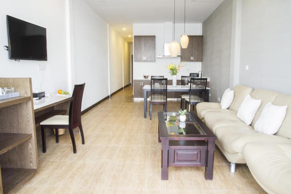 TV a/nebo společenská místnost v ubytování Asiban Quay Boutique Hotel