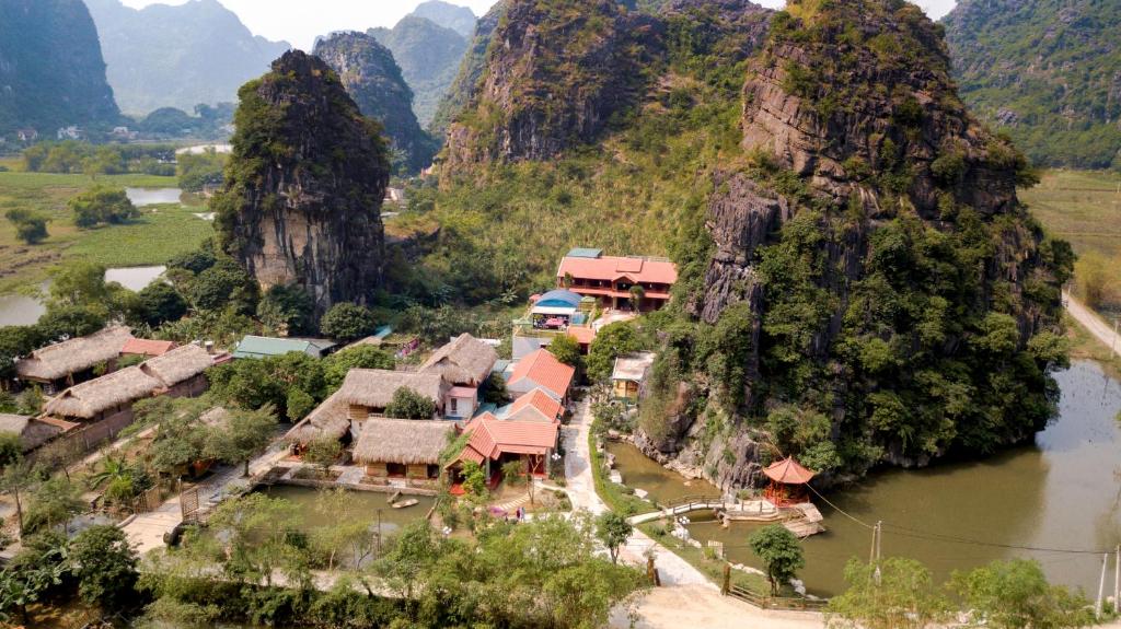an aerial view of a village on a mountain at Trang An Heritage Garden in Ninh Binh