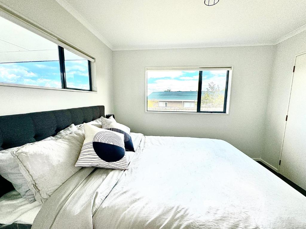 Postel nebo postele na pokoji v ubytování Tranquil Taupo