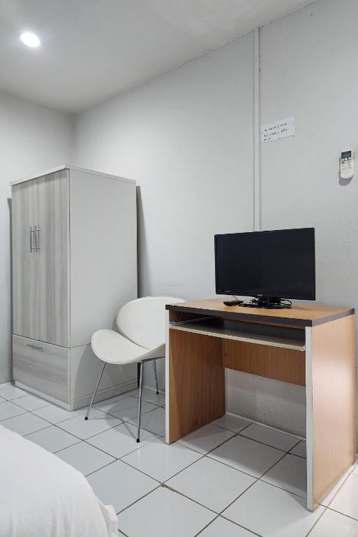 TV a/nebo společenská místnost v ubytování Freesia Bangphi Guest House