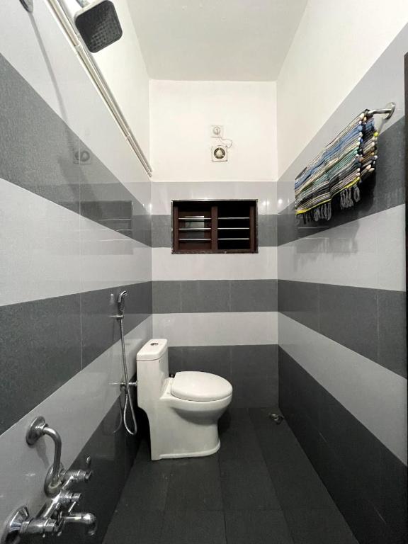 Koupelna v ubytování Evaa Homes