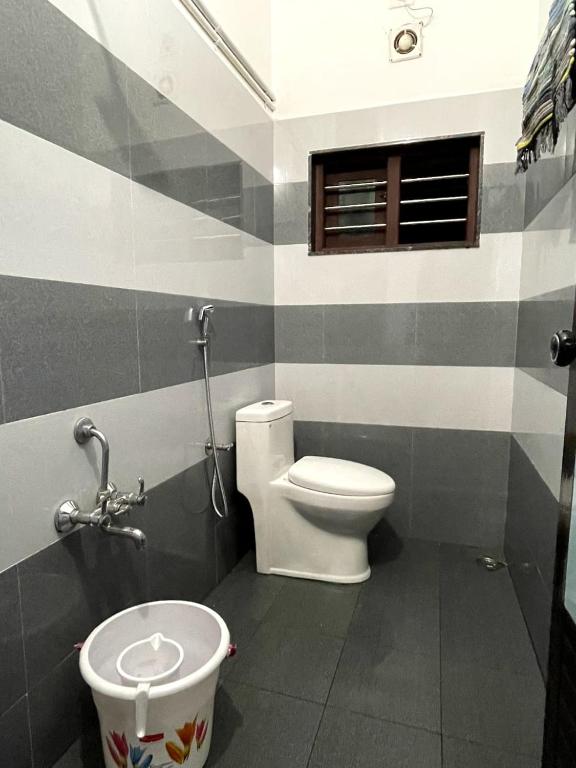Koupelna v ubytování Evaa Homes