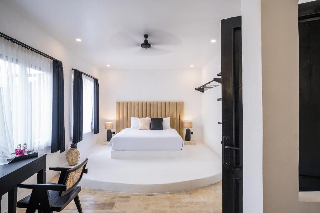 Postel nebo postele na pokoji v ubytování Casa Art Ubud