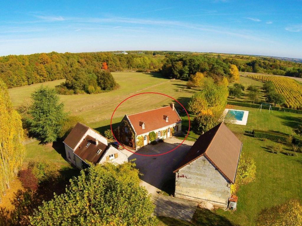 an aerial view of a house in a field at Charming Holiday Home in Montrichard with Pool in Bourré