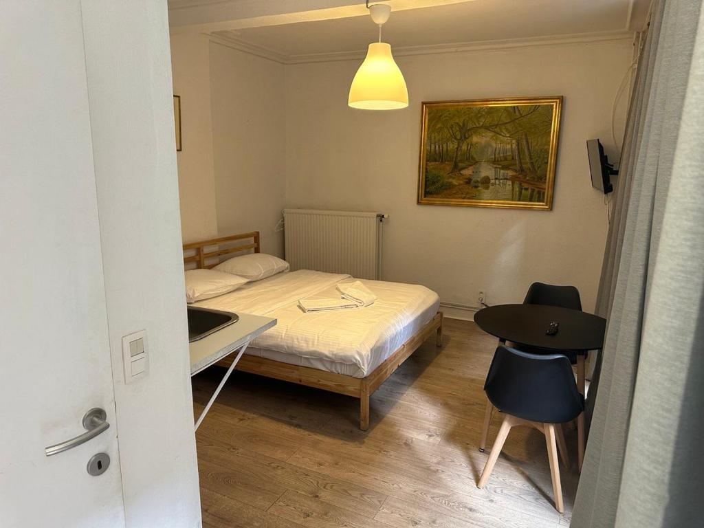 Postel nebo postele na pokoji v ubytování BED Collège