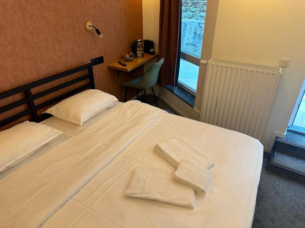 Postel nebo postele na pokoji v ubytování BED Collège