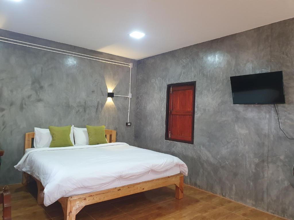 TV a/nebo společenská místnost v ubytování Mind's Homestay มายด์โฮมสเตย์