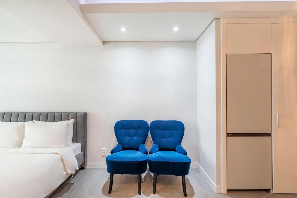Postel nebo postele na pokoji v ubytování Centum Convention Hotel In Centum