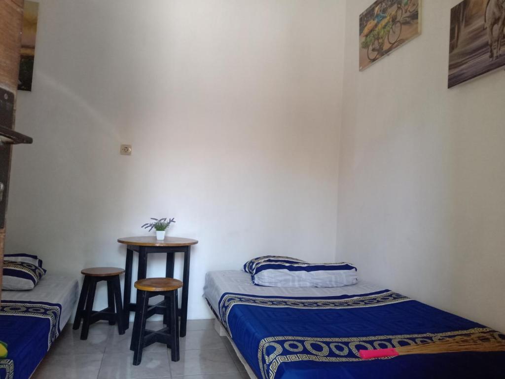 Postel nebo postele na pokoji v ubytování Kost Backpacker