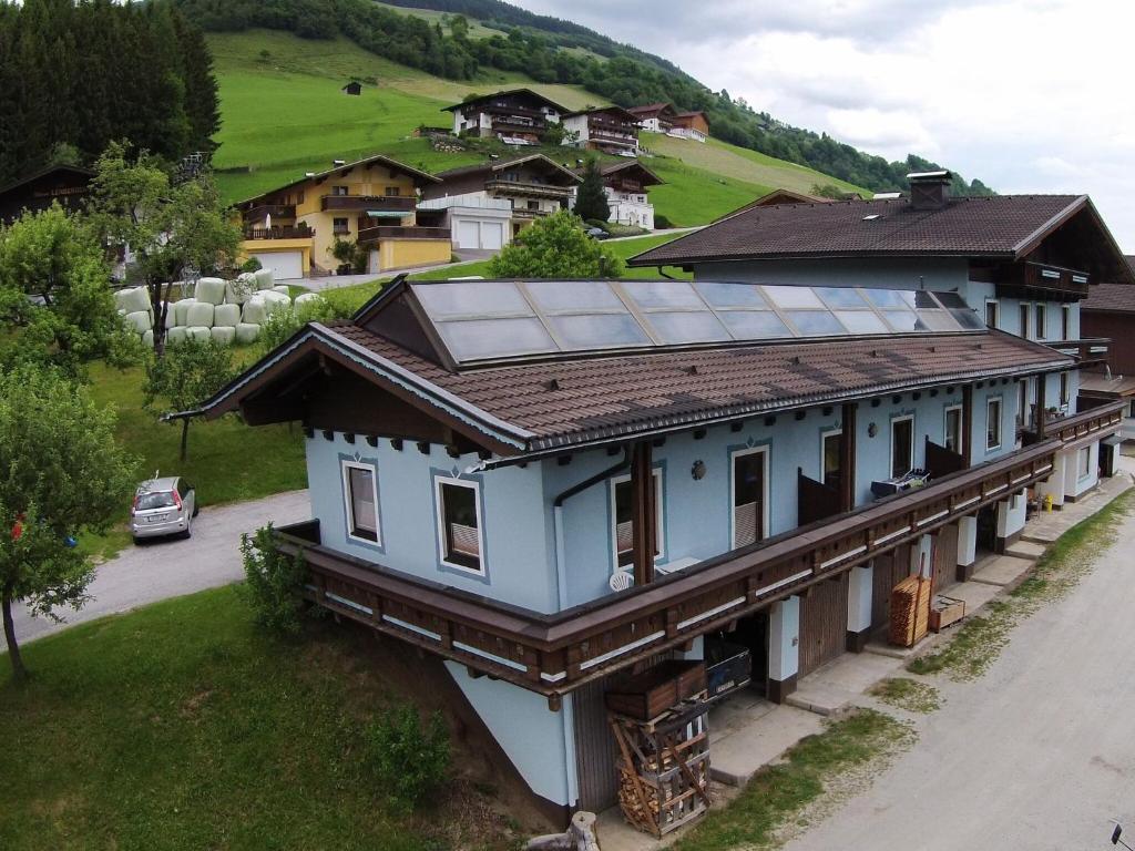 an overhead view of a house with a solar roof at Spacious Apartment near Ski Area in Mittersill in Mittersill