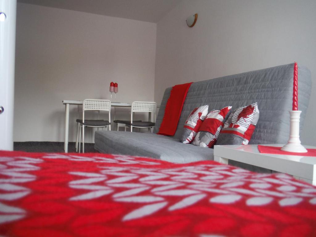 Säng eller sängar i ett rum på Apartament Słoneczny