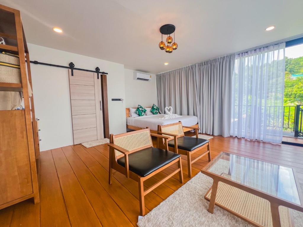 Ein Sitzbereich in der Unterkunft Baan View Talay Pool Villas