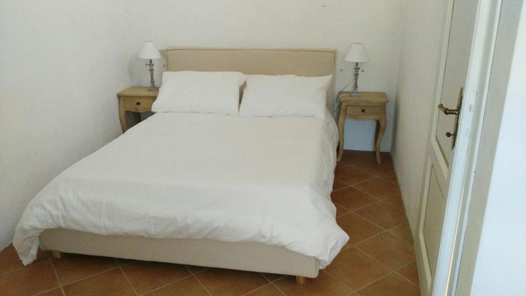 A bed or beds in a room at Apartment Casa Gianfrati