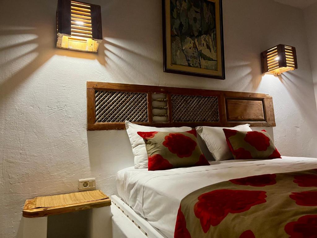 Postel nebo postele na pokoji v ubytování Dar Yessine Boutique Hôtel