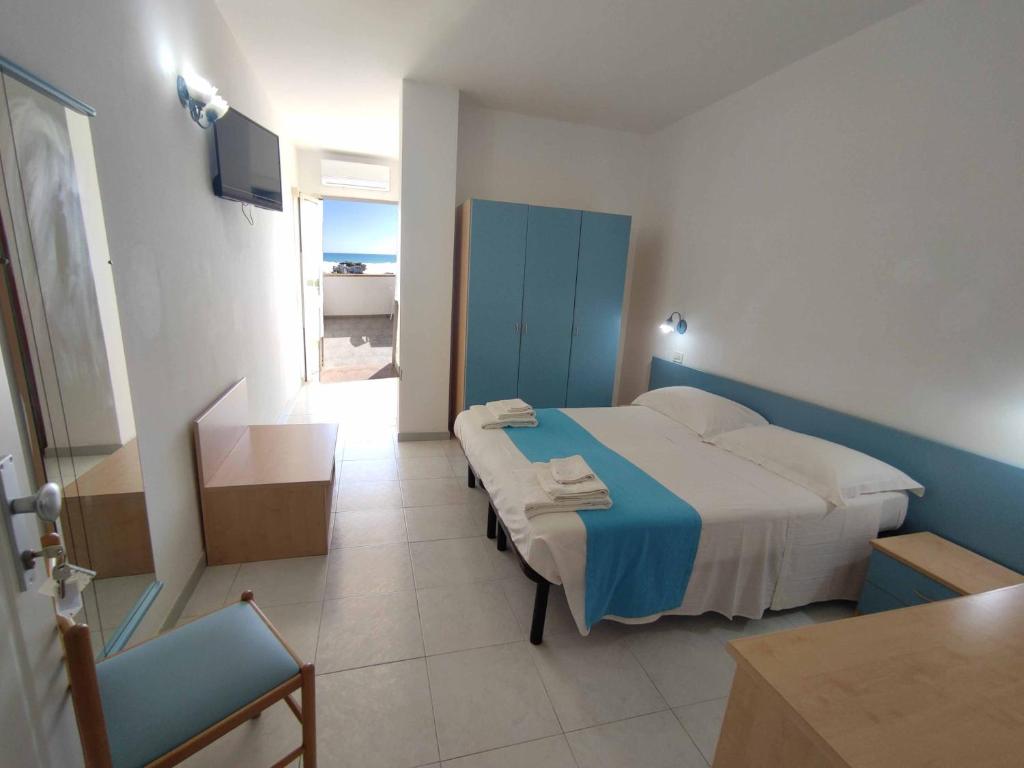 Postel nebo postele na pokoji v ubytování Picchio Hotel Pescoluse