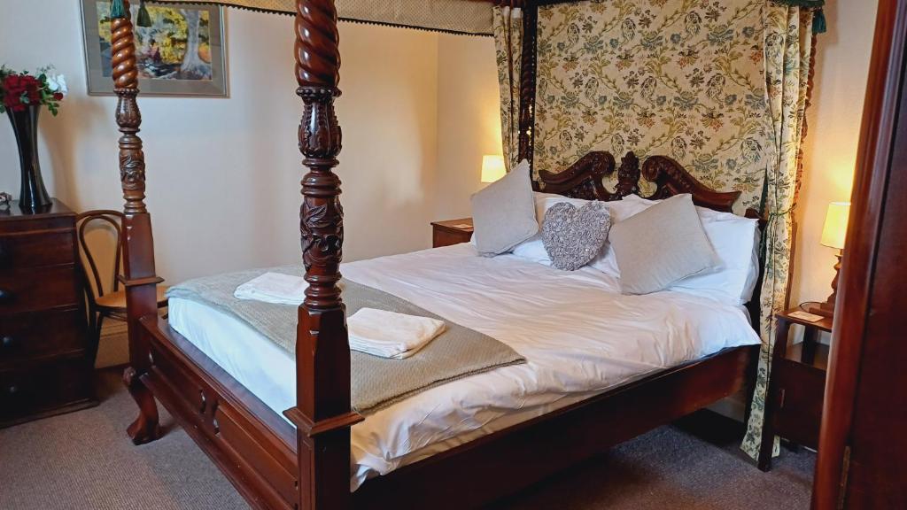 Postel nebo postele na pokoji v ubytování Ardbrecknish House