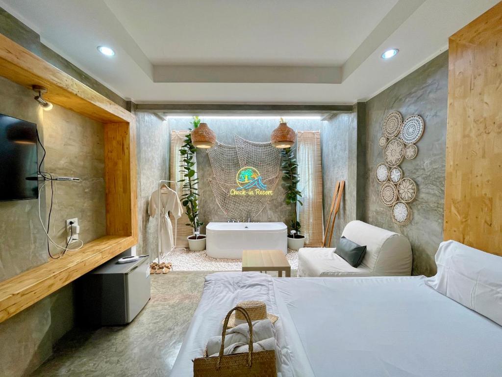 Postel nebo postele na pokoji v ubytování Check-in Resort Koh Larn