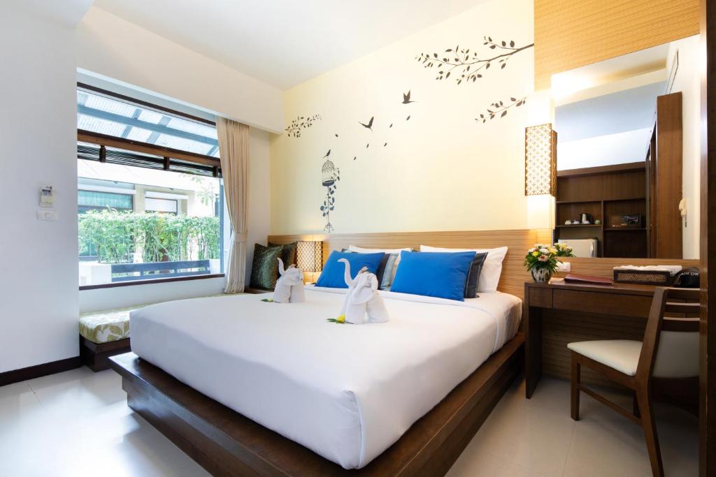 Postel nebo postele na pokoji v ubytování A2 Pool Resort - SHA Plus
