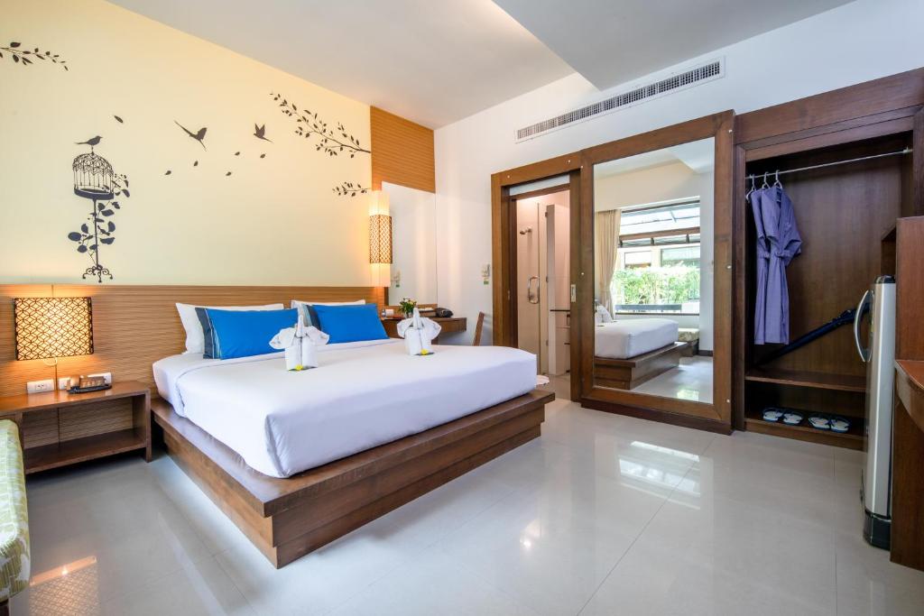Postel nebo postele na pokoji v ubytování A2 Pool Resort - SHA Plus