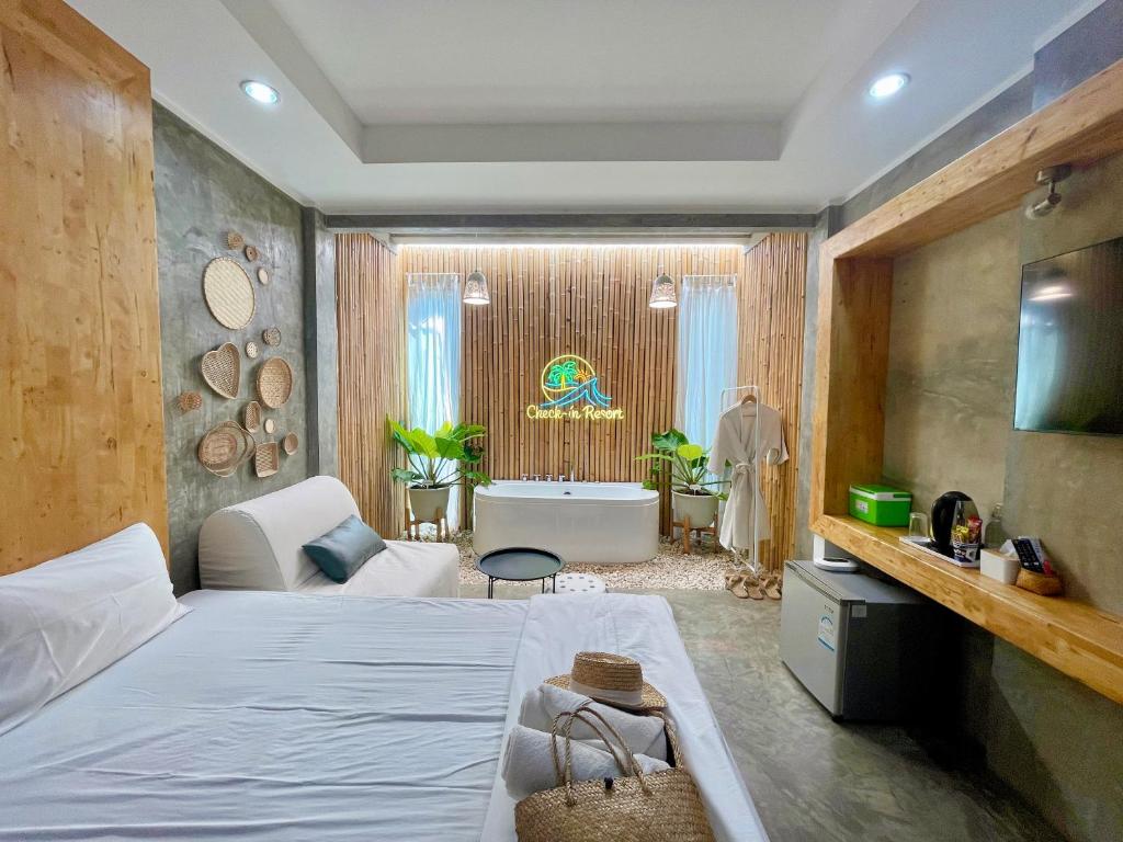 Postel nebo postele na pokoji v ubytování Check-in Resort Koh Larn