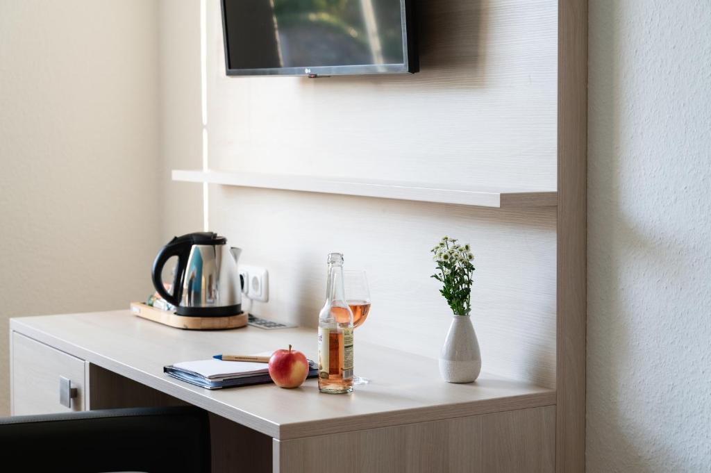 TV a/nebo společenská místnost v ubytování Hotel Alte Fischereischule