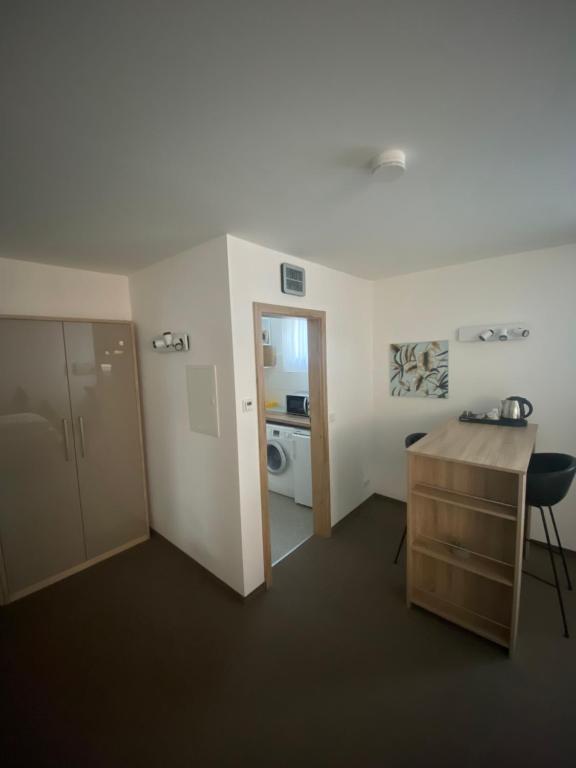 Kuchyň nebo kuchyňský kout v ubytování Atrium Garni